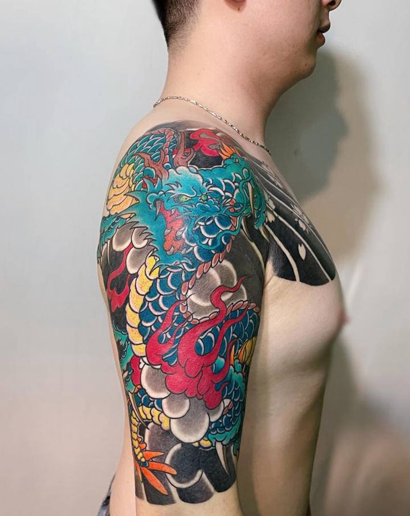 半胛龙纹身图片_手臂胸部老传统纹身图案