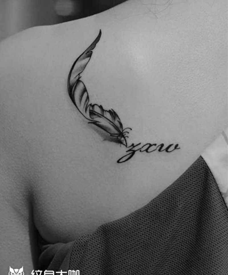 羽毛签名纹身纹身图片_背部胸部水彩水墨纹身图案