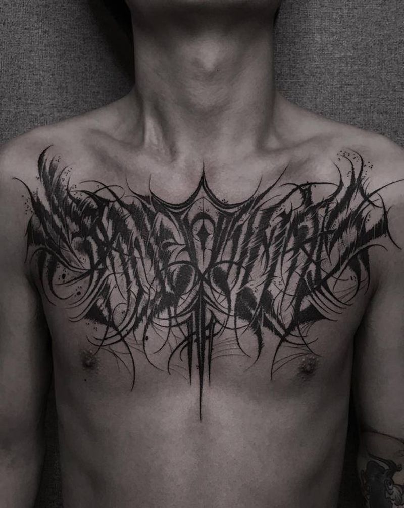 花胸纹身图片_胸部花体字纹身图案