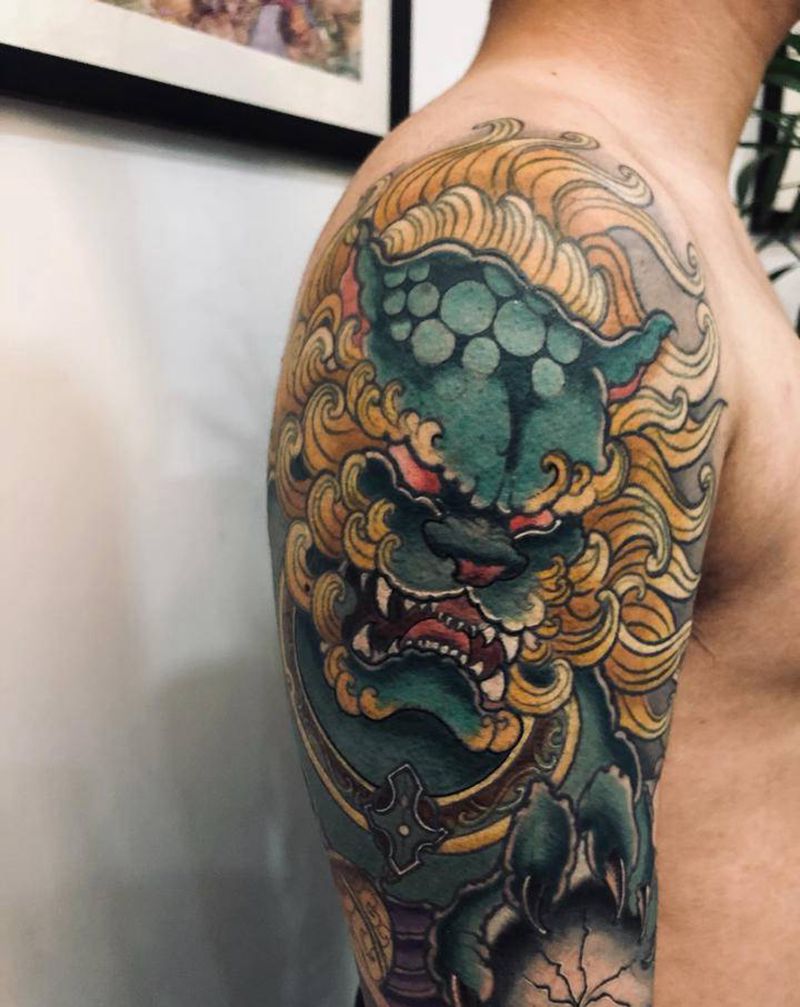 唐狮纹身图片_手臂新传统唐狮纹身图案