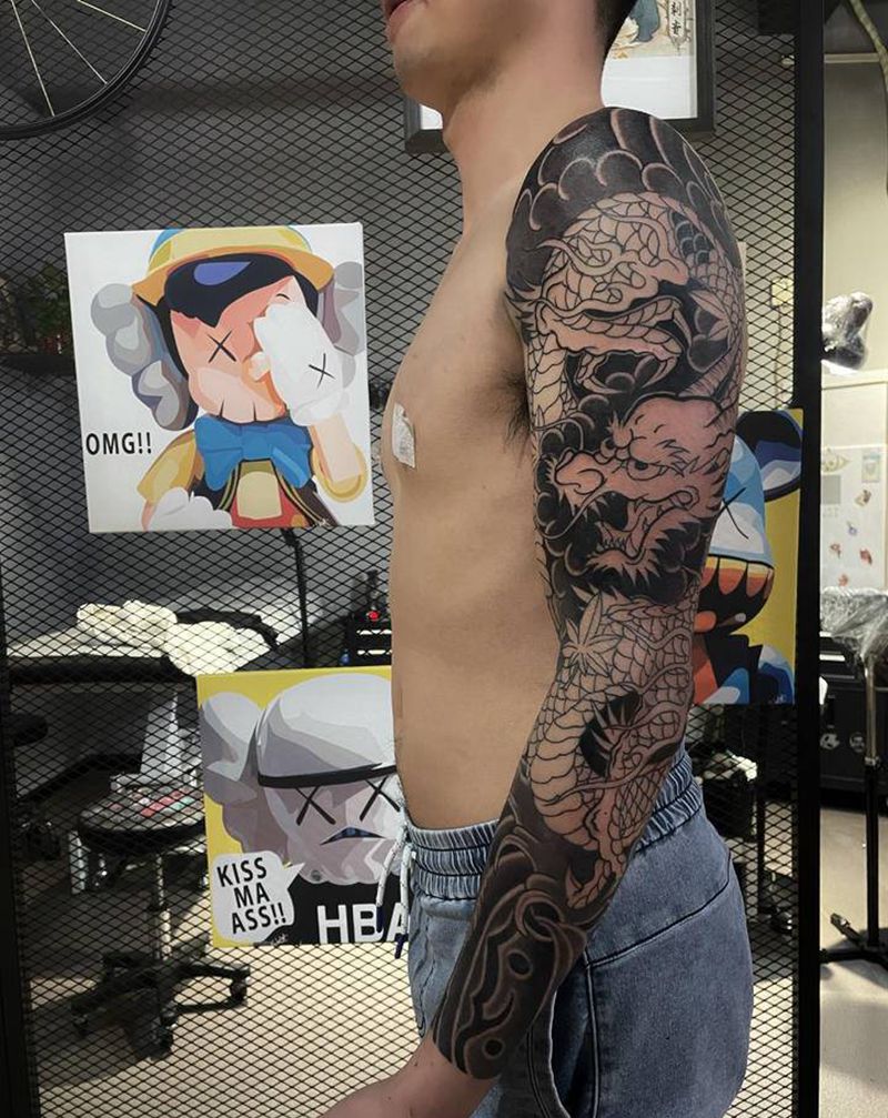 日式老传统  龙花臂纹身图片_手臂老传统纹身图案