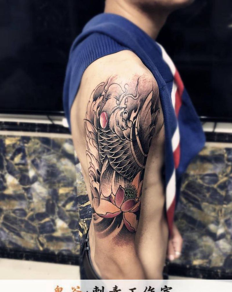 鱼纹身图片_手臂纹身图案