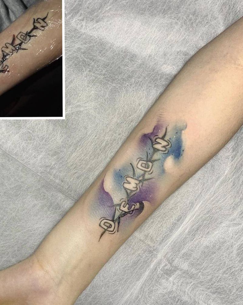 修改纹身图片_手臂水彩纹身图案