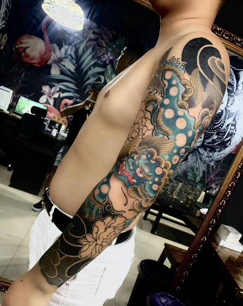 老传统唐狮花臂未完成纹身图片_手臂老传统纹身图案