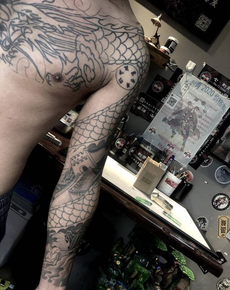 过肩龙 添加修改 未完纹身图片_手臂胸部新传统老传统纹身图案