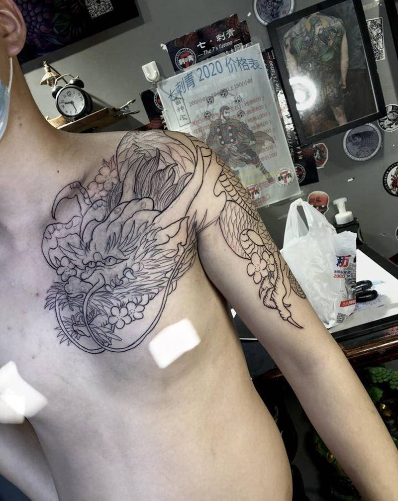 半胛龙 过肩龙 未完纹身图片_手臂肩部新传统老传统披肩龙纹身图案