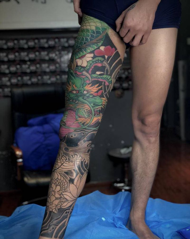 花腿龙未完纹身图片_脚部腿部老传统新传统盘腿龙纹身图案