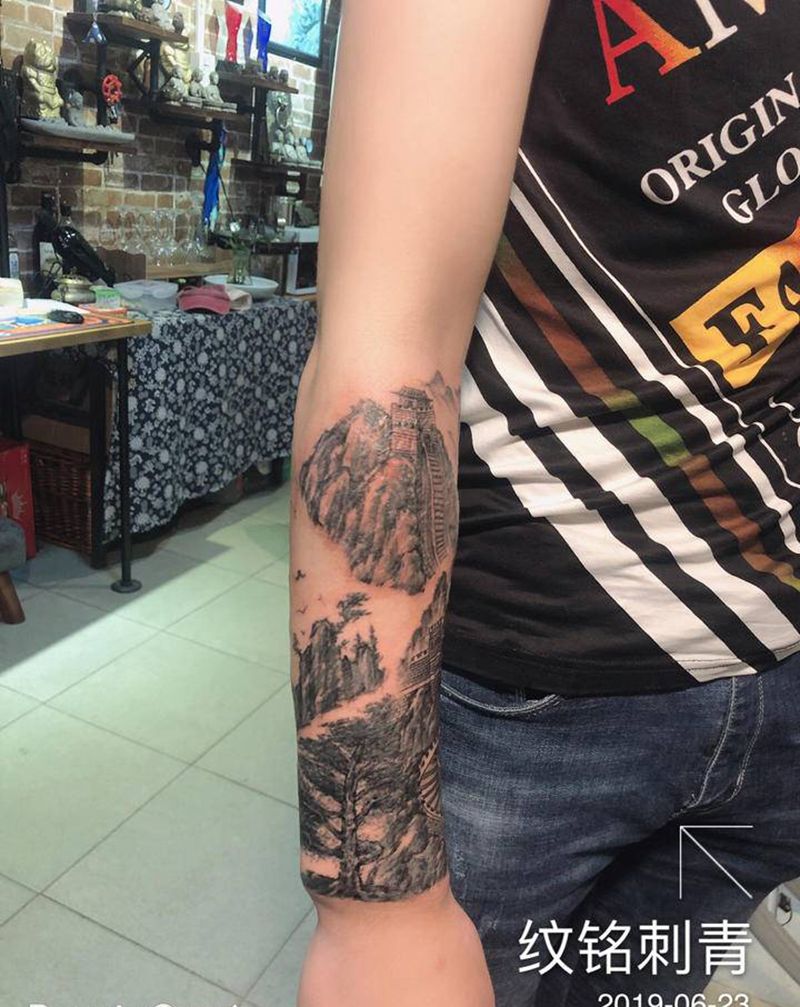 山水作品盖疤纹身图片_手臂纹身图案