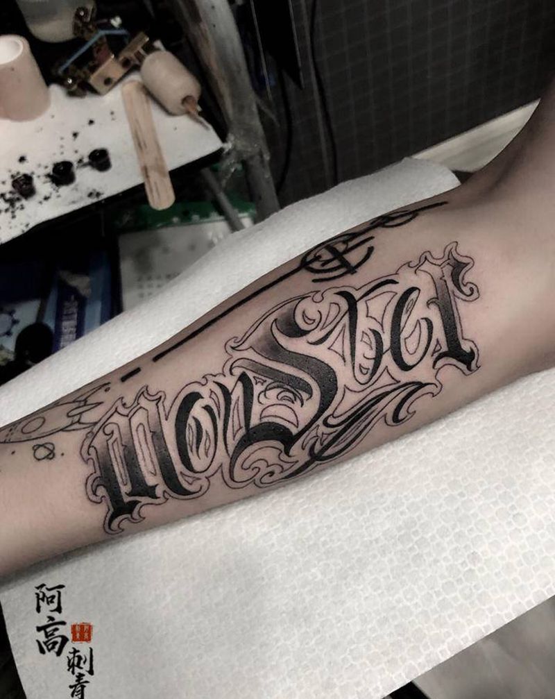 奇卡诺纹身图片_手臂花体字纹身图案