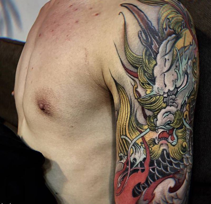 麒麟纹身图片_手臂新传统麒麟纹身图案