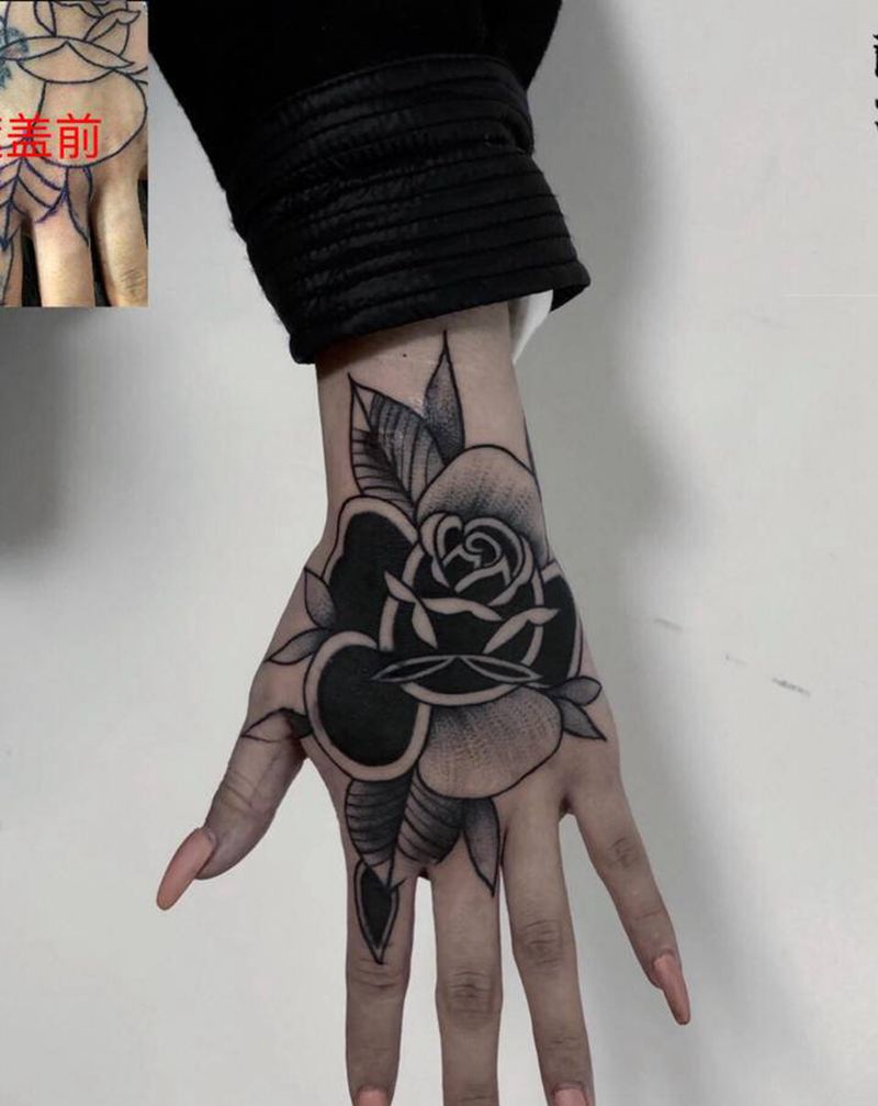 遮盖花手纹身图片_手部Old School点刺纹身图案