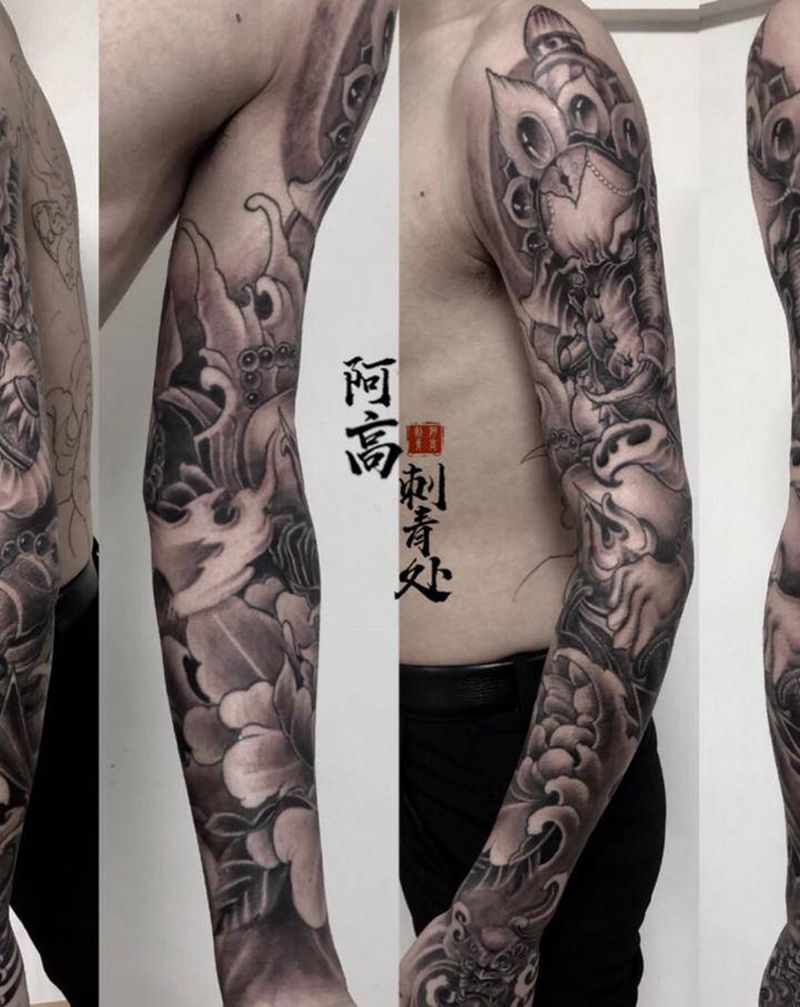 传统象神花臂纹身图片_手臂新传统纹身图案