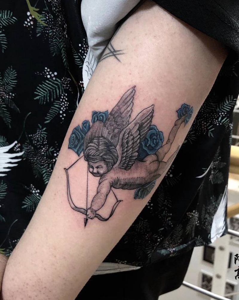 丘比特纹身图片_手臂点刺纹身图案