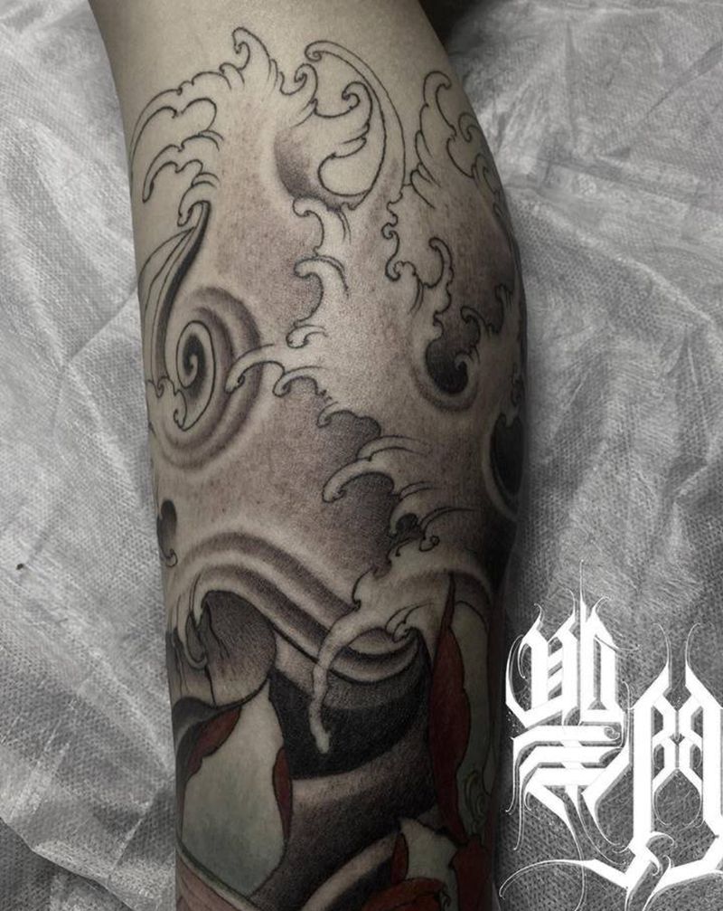 水浪纹身图片_腿部纹身图案