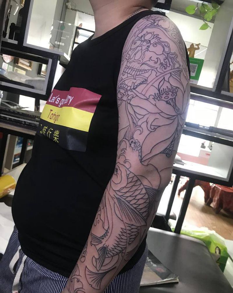 花臂纹身图片_手臂新传统纹身图案