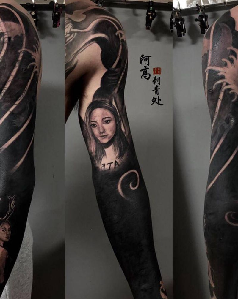 黑臂纹身图片_手臂老传统欧美写实纹身图案
