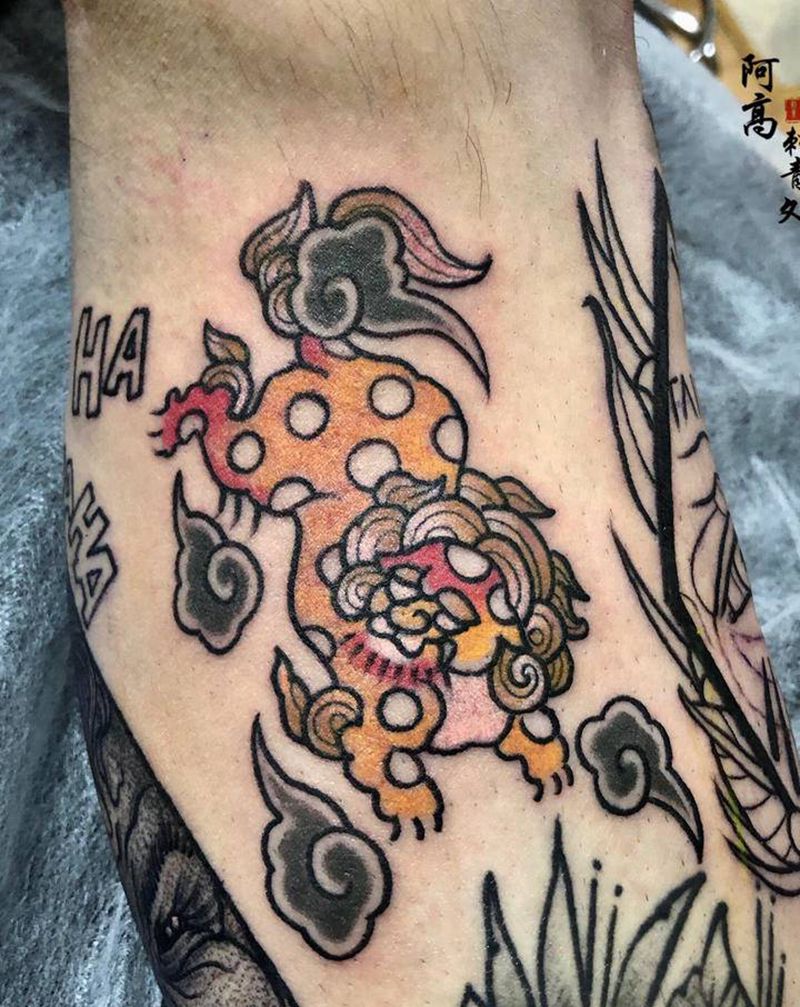 唐狮纹身图片_腿部老传统纹身图案