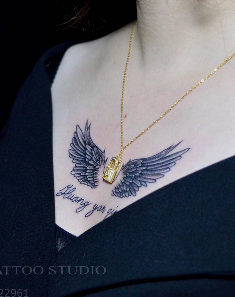 翅膀纹身图片_胸部纹身图案