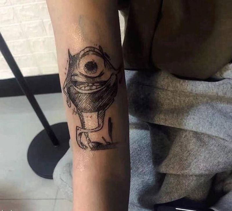 小怪物纹身图片_手臂纹身图案