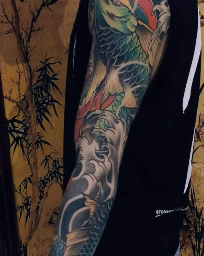 花臂纹身图片_手臂新传统纹身图案