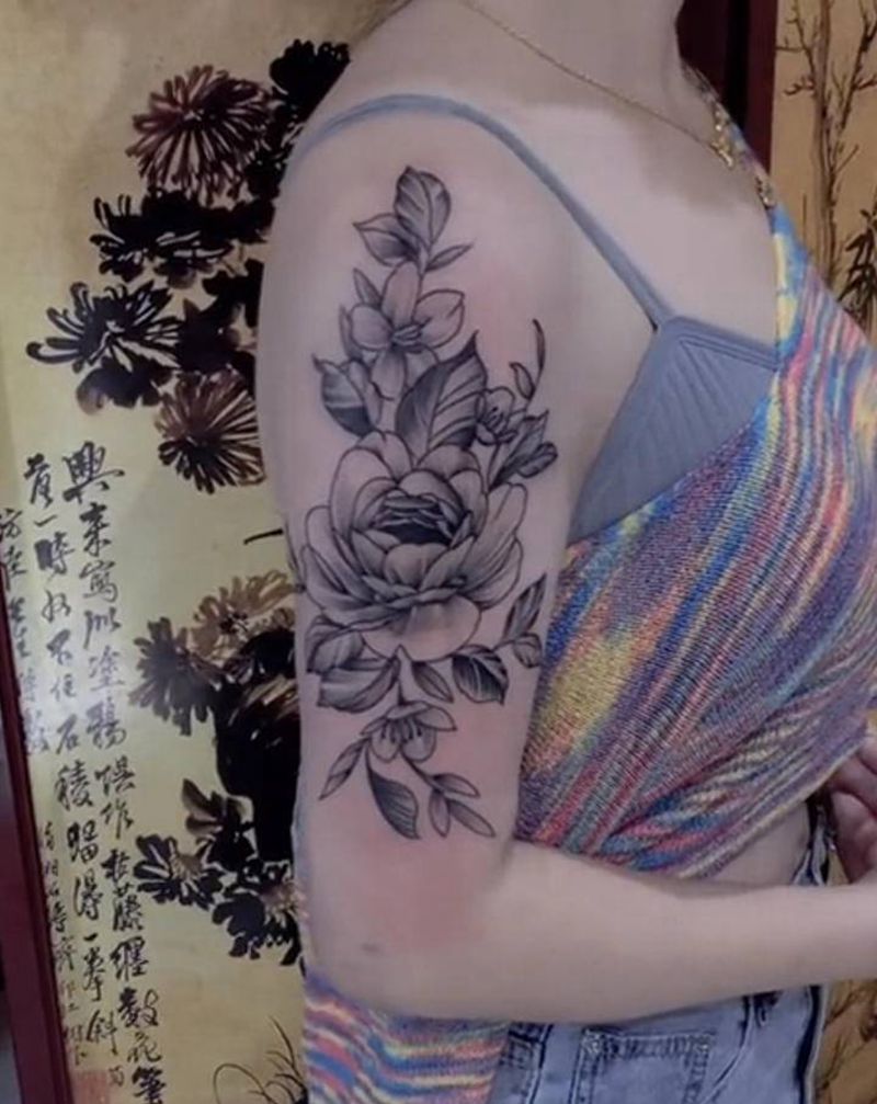 素花纹身图片_手臂点刺纹身图案