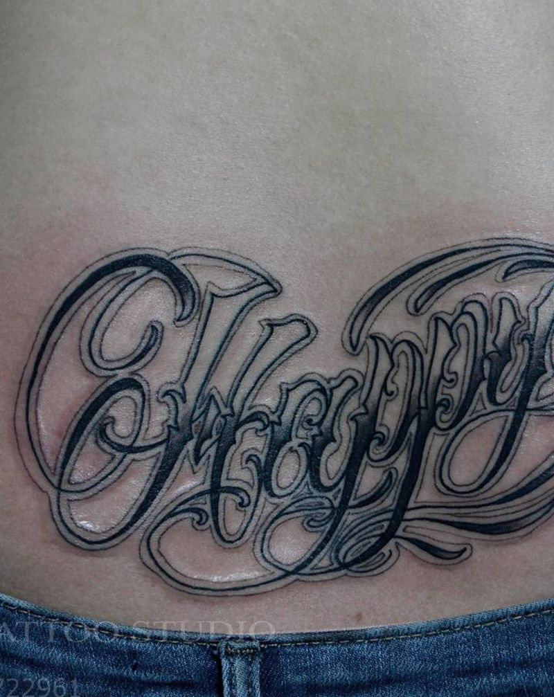花体字纹身图片_腰部纹身图案