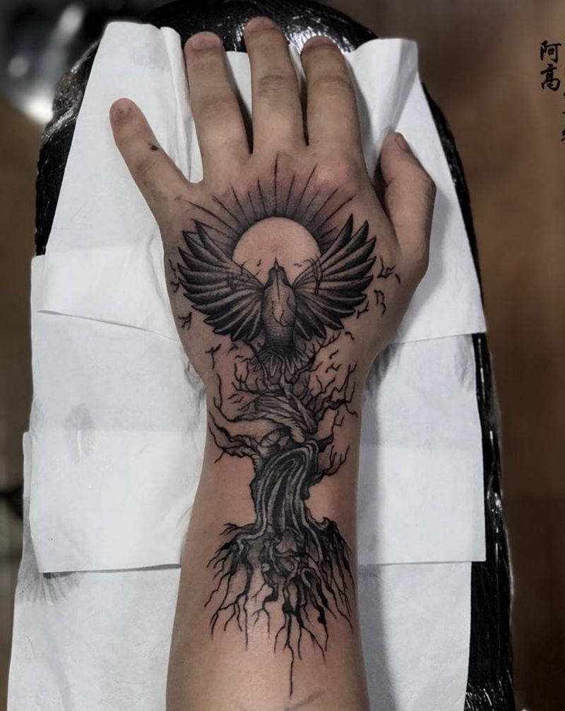 手背金乌纹身图片_手部点刺纹身图案