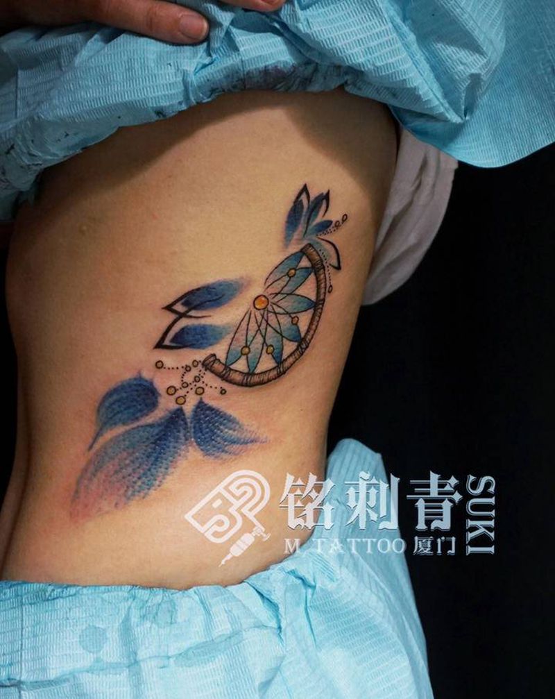 定做捕梦网纹身图片_腰部New School水彩纹身图案