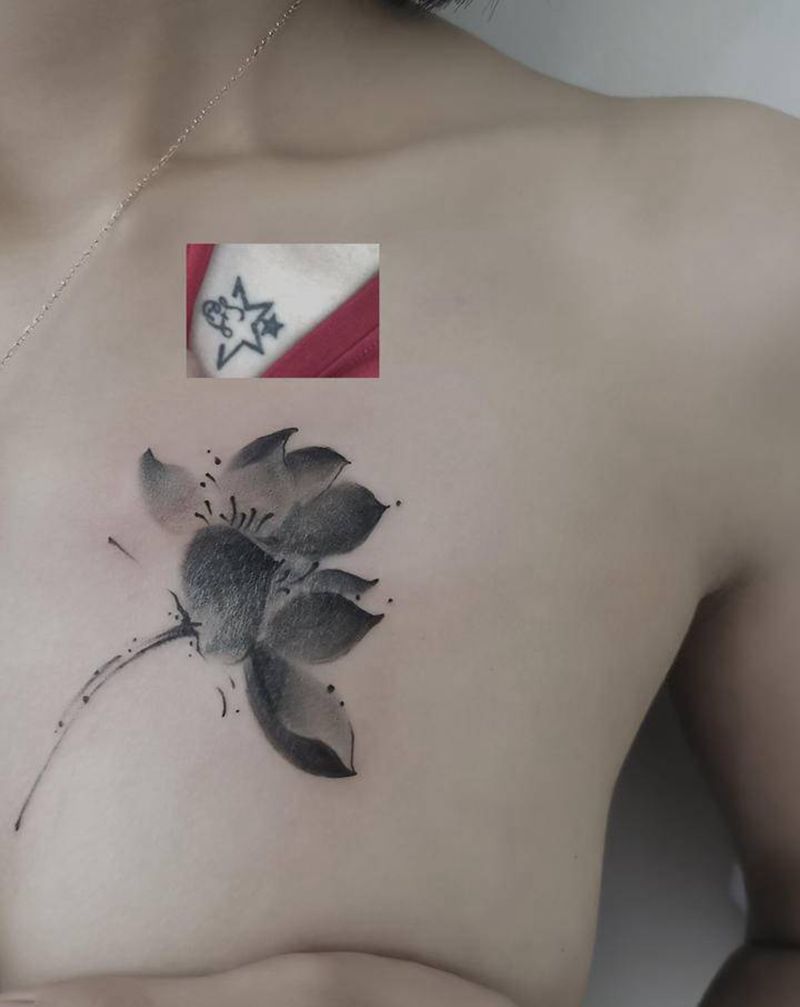 莲花遮盖纹身图片_胸部水墨纹身图案