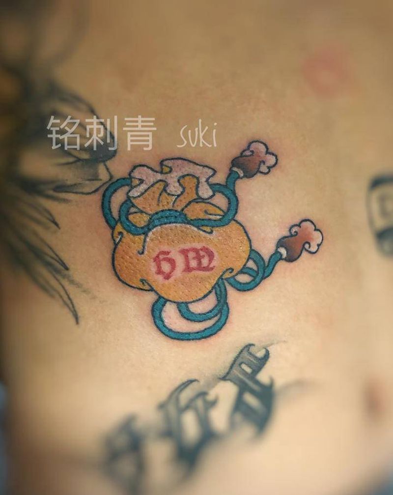 福袋纹身图片_腹部Old School纹身图案