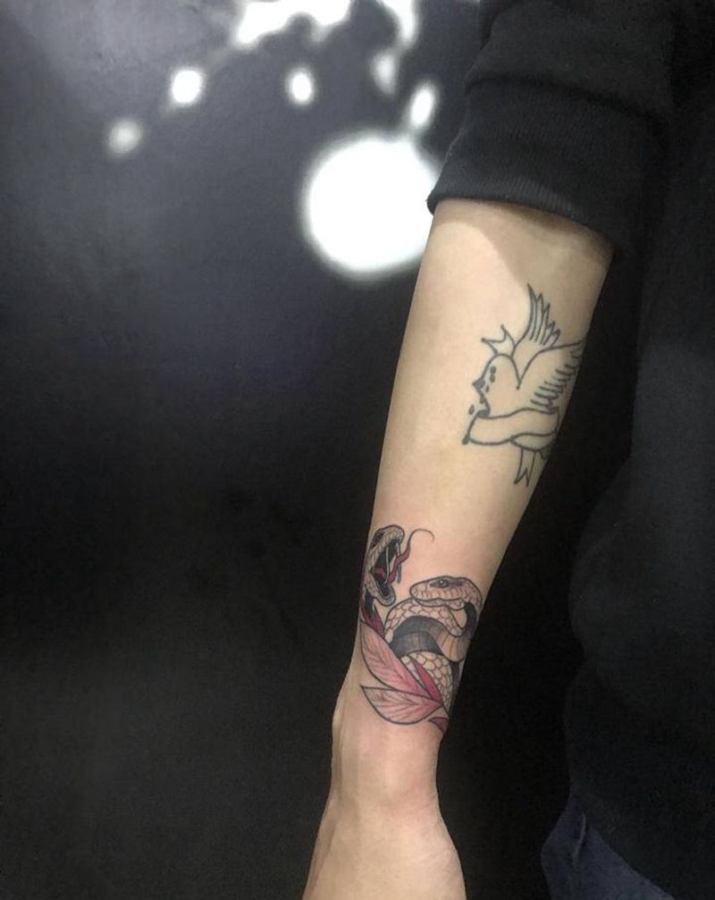 小白小青纹身图片_手臂纹身图案