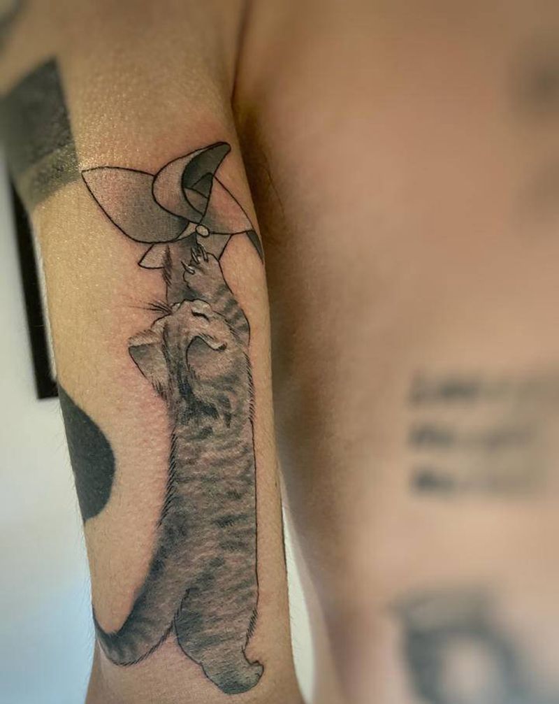 小猫纹身图片_手臂欧美写实纹身图案