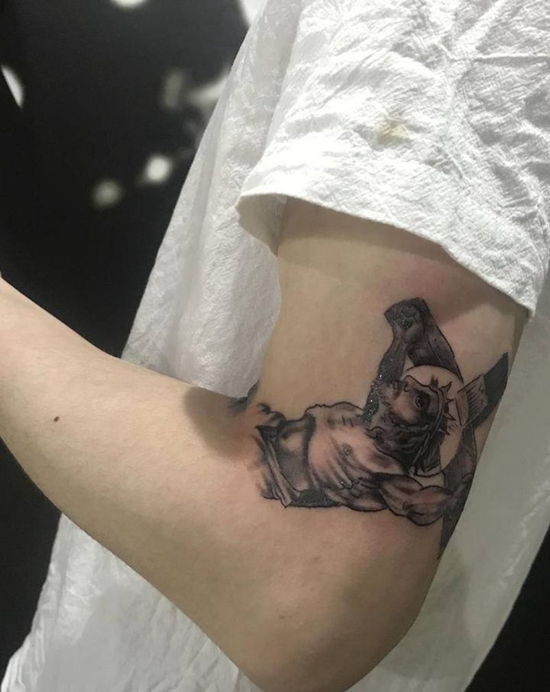 耶稣纹身图片_手臂纹身图案