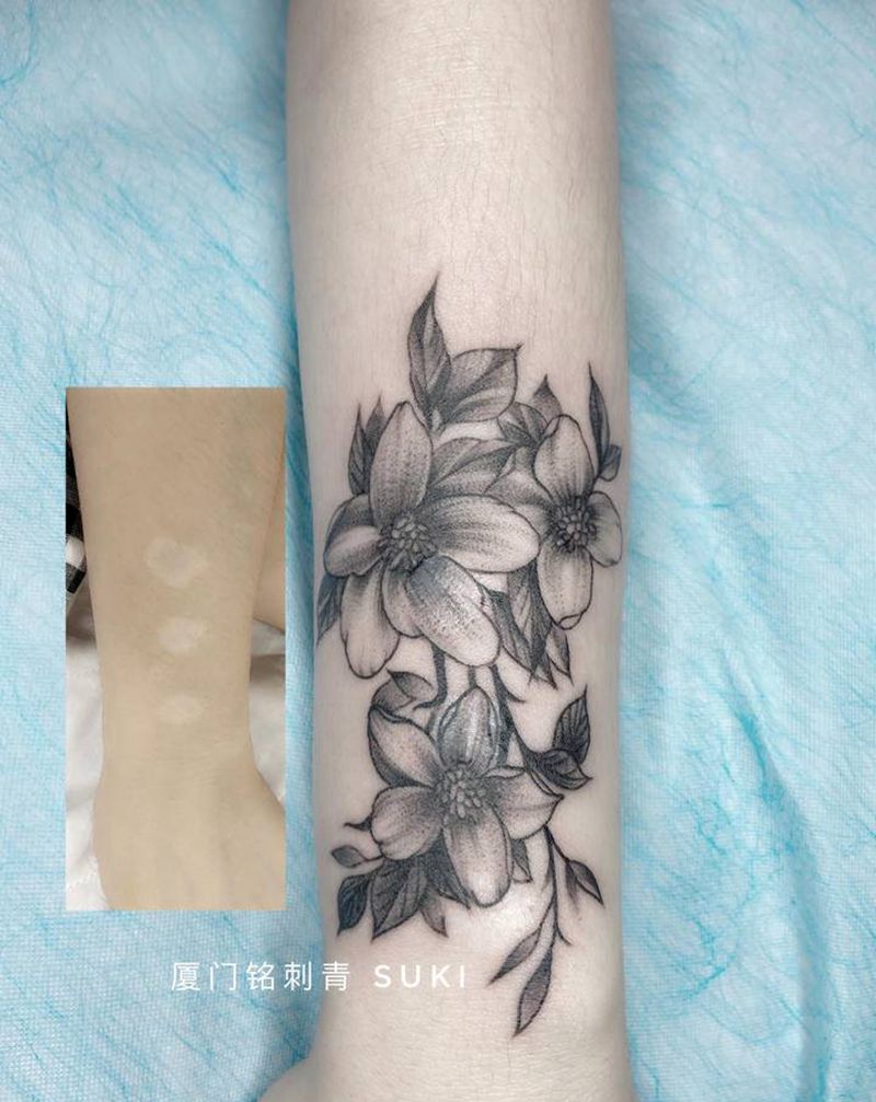 素花纹身图片_手臂素花纹身图案