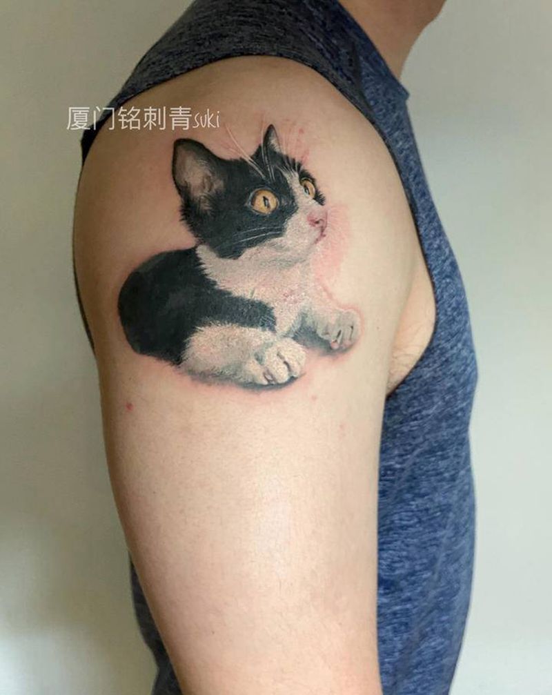 猫星人纹身图片_手臂欧美写实纹身图案