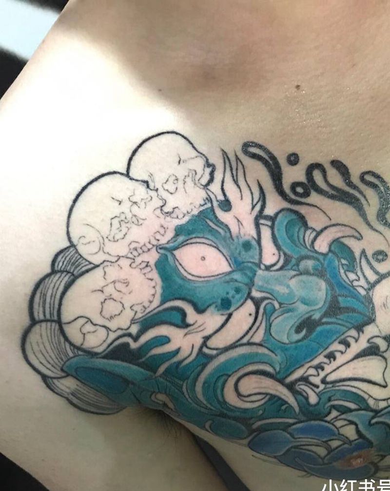 胸口大黑天纹身图片_胸部纹身图案