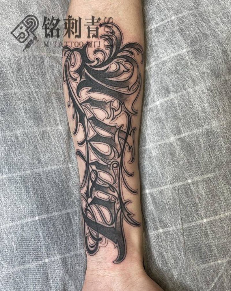 奇卡诺英文纹身图片_手臂花体字纹身图案