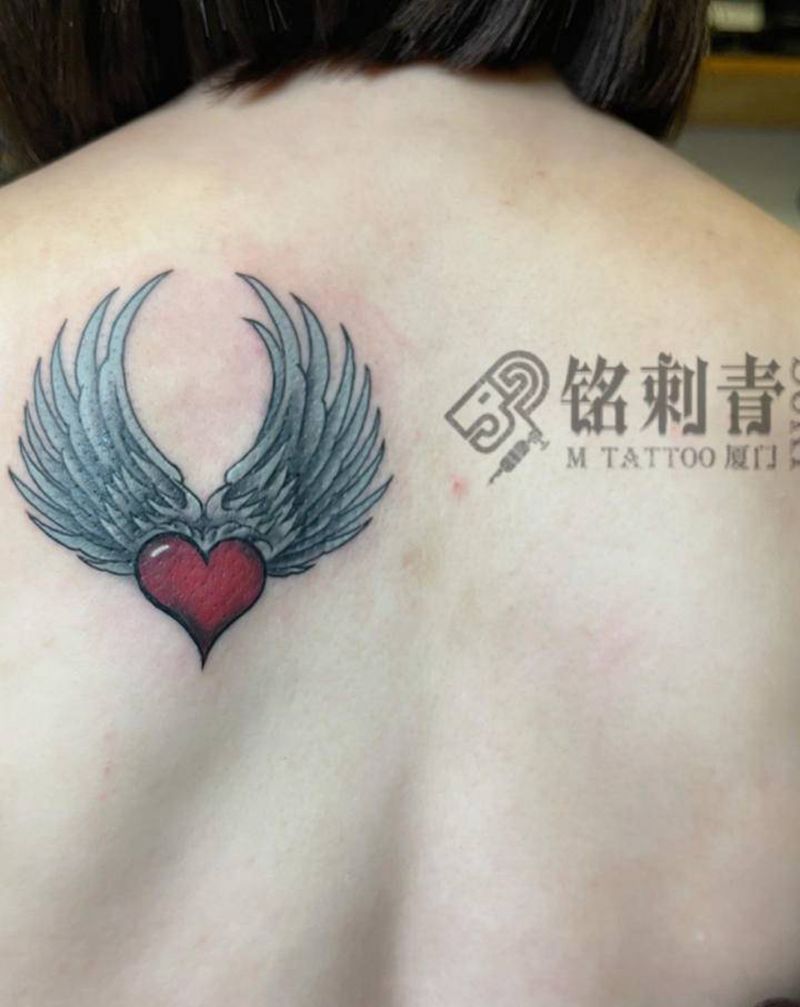 遮盖作品一枚纹身图片_背部纹身图案