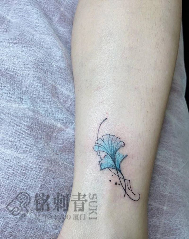 银杏叶纹身图片_腿部纹身图案