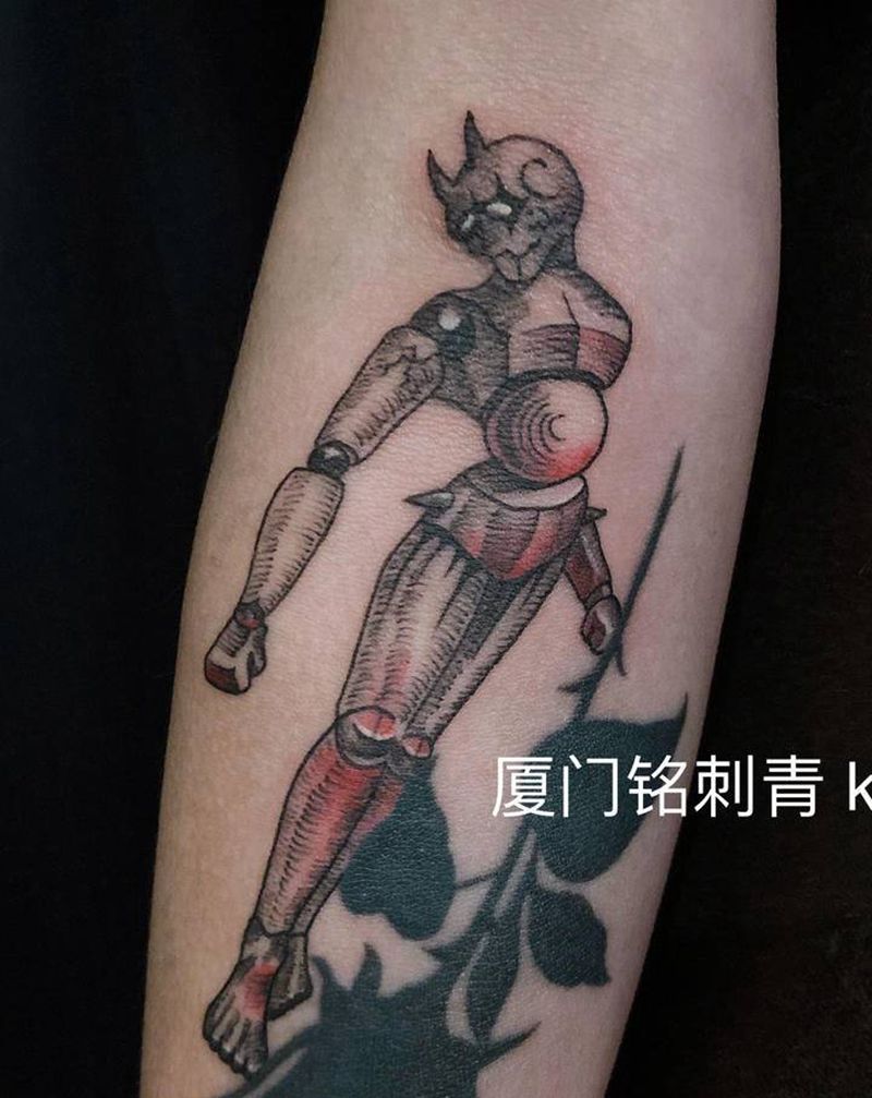 人偶纹身图片_手臂纹身图案