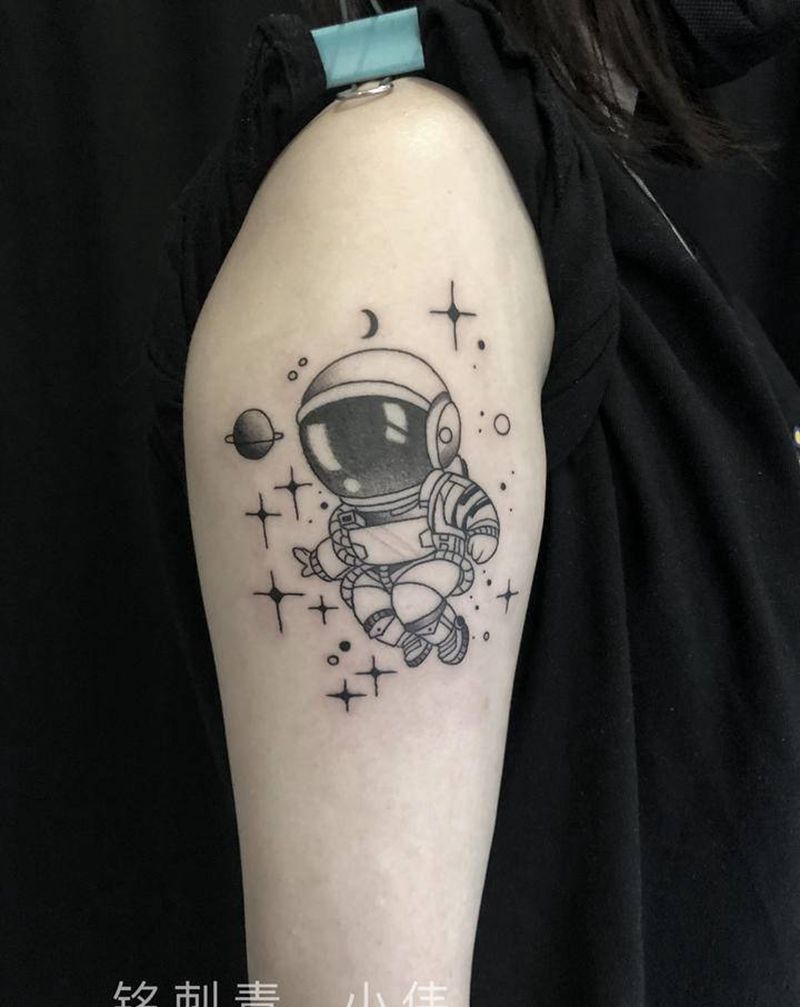 太空人纹身图片_手臂纹身图案