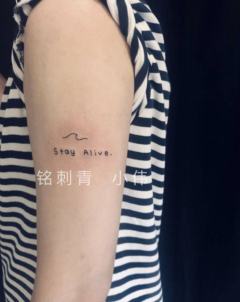 英文纹身图片_手臂花体字纹身图案