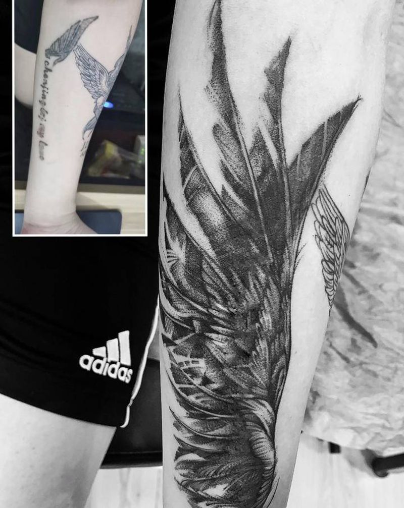 翅膀遮盖纹身图片_手臂点刺欧美写实翅膀遮盖点刺纹身图案
