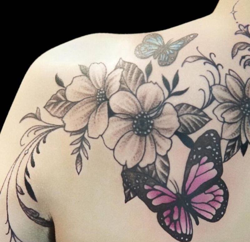 素花纹身图片_背部点刺纹身图案