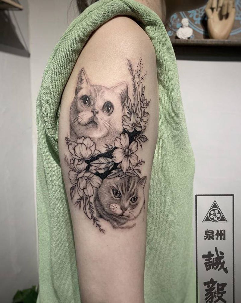 两只猫咪纹身图片_手臂腿部欧美写实点刺猫纹身图案