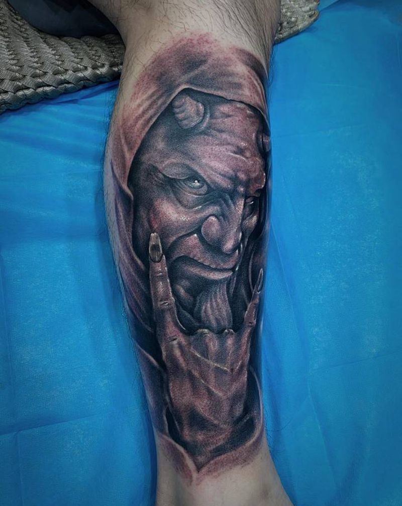 撒旦纹身图片_腿部欧美写实纹身图案