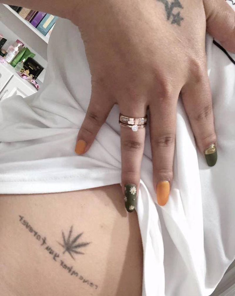 素花遮盖旧纹身纹身图片_腰部点刺纹身图案