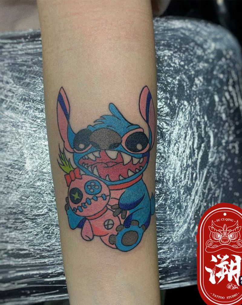 史迪仔纹身图片_手臂手部New School史迪仔彩色小图纹身图案