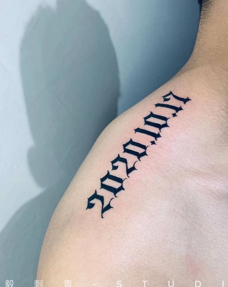 哥特式纪念日纹身图片_手臂肩部花体字几何纹身图案