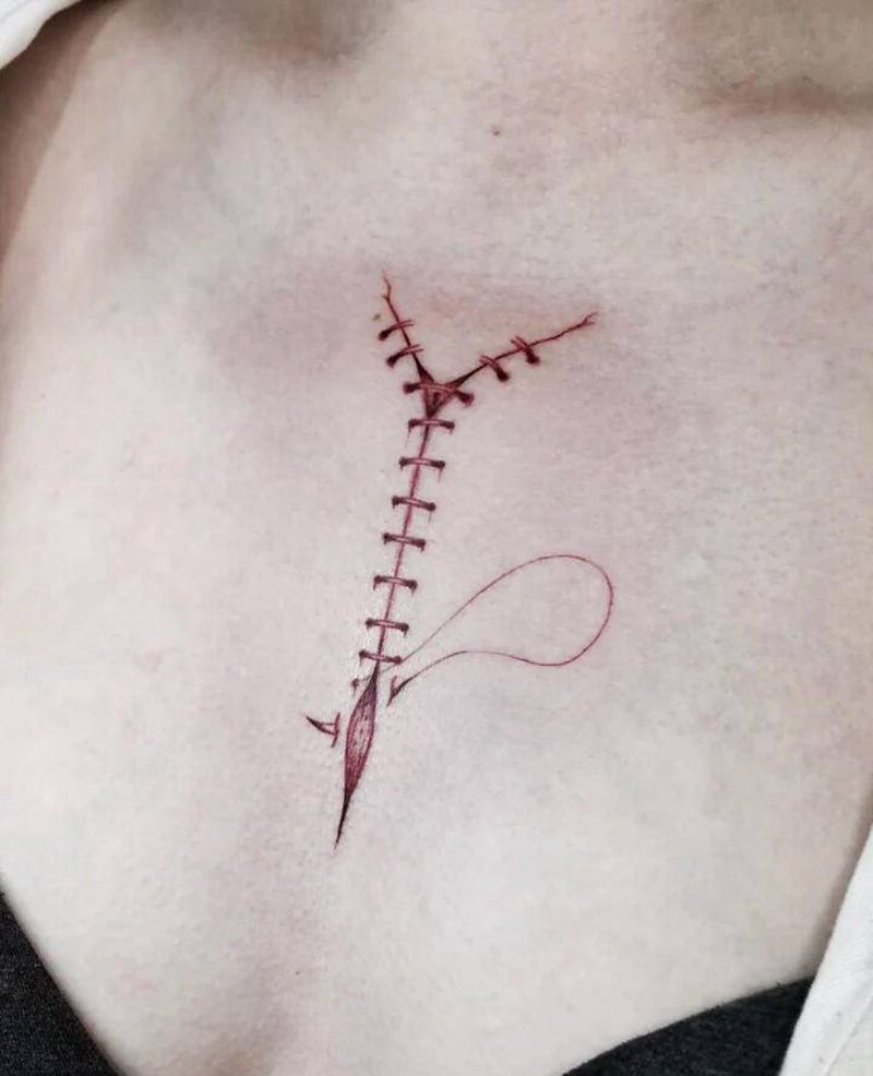 针线缝合纹身图片_胸部纹身图案